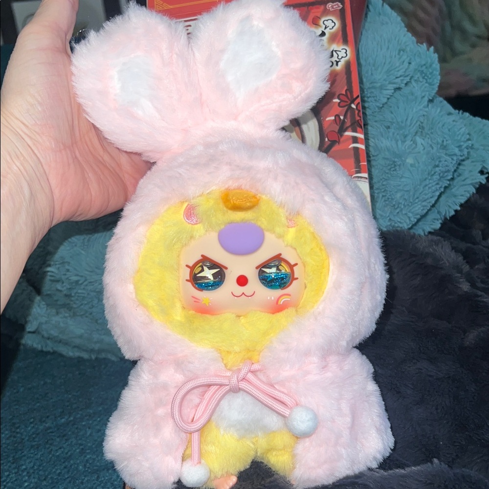 Look at these eyes! This chick dressed as a bunny needs an Easter basket!